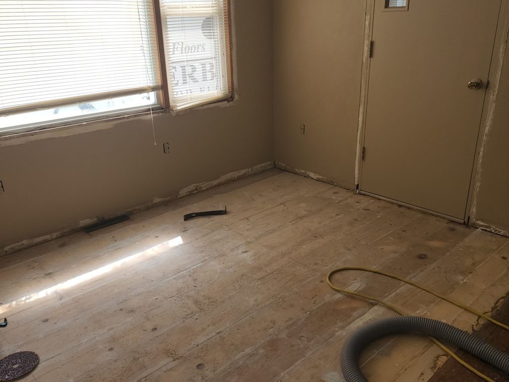 A room with the floor being remodeled.